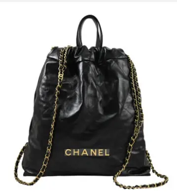CHANEL 香奈兒金屬大LOGO小牛皮束口金鍊後背包
